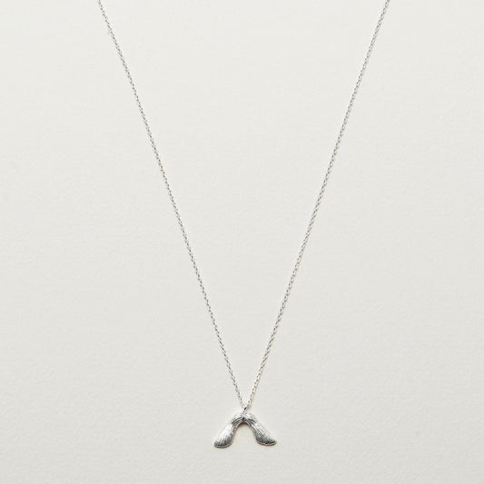 Necklace with maple seed pendant in silver