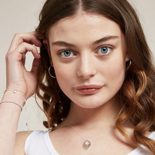 Necklace with a dandelion pendant in silver