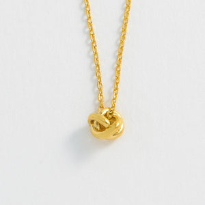 
            
                Load image into Gallery viewer, Estella Bartlett - Necklace | Knot Charm Necklace | Gold Plated
            
        