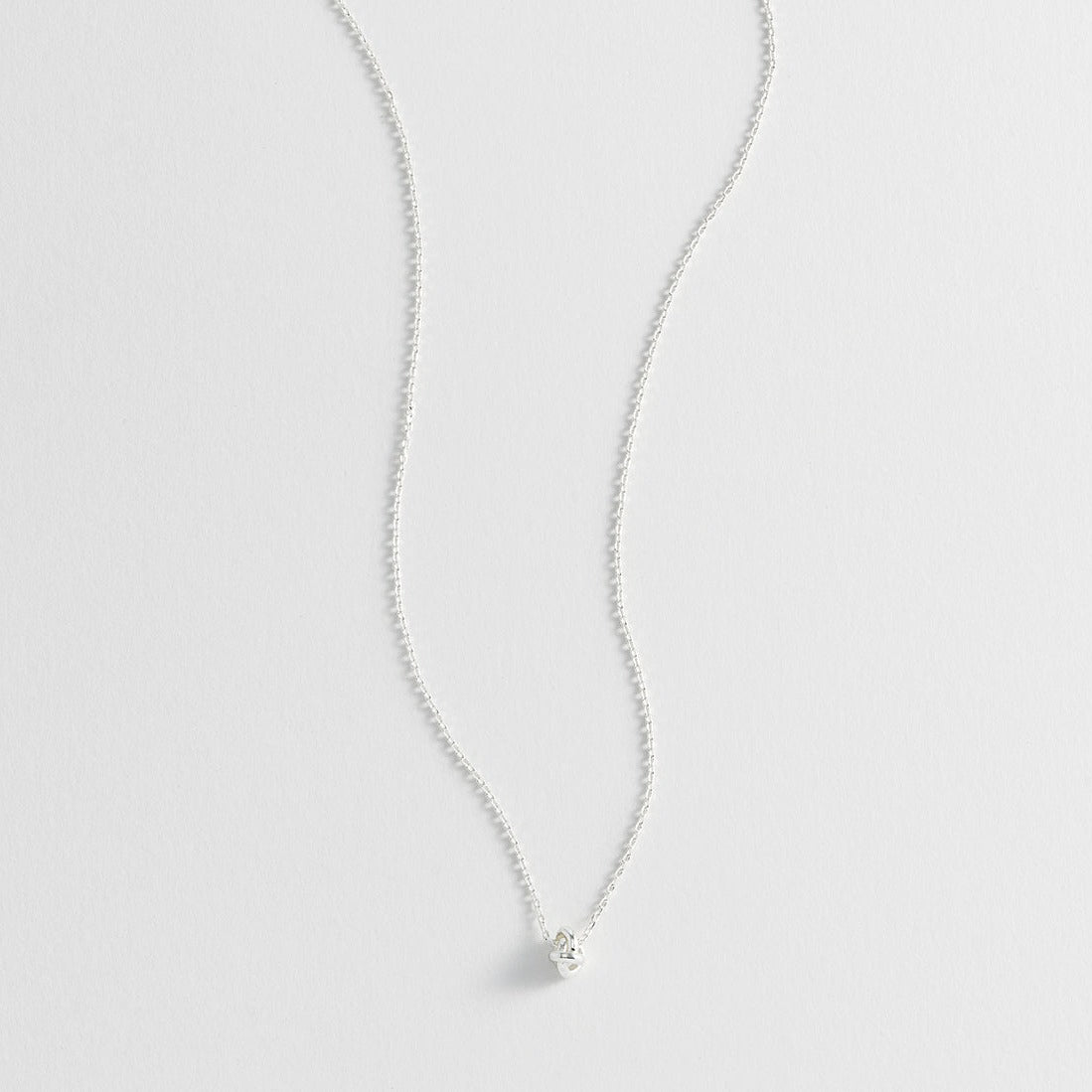 Estella Bartlett - Necklace | Knot Charm Necklace | Silver Plated