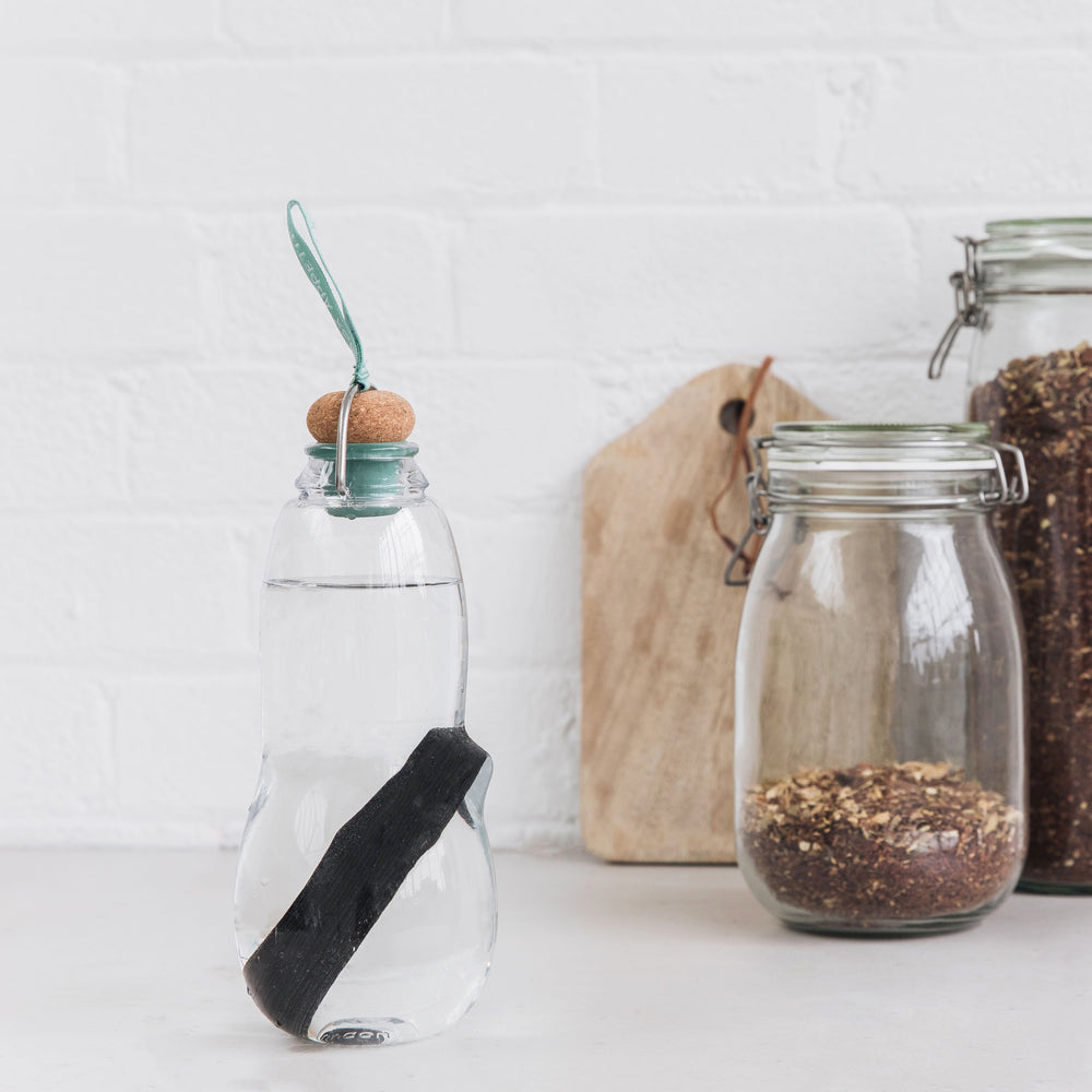 Water bottle with binchotan charcoal filter in olive