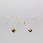 Caged ball charm gold hoop earrings