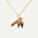 Necklace with a Swallow bird pendant in gold by Katy Welsh
