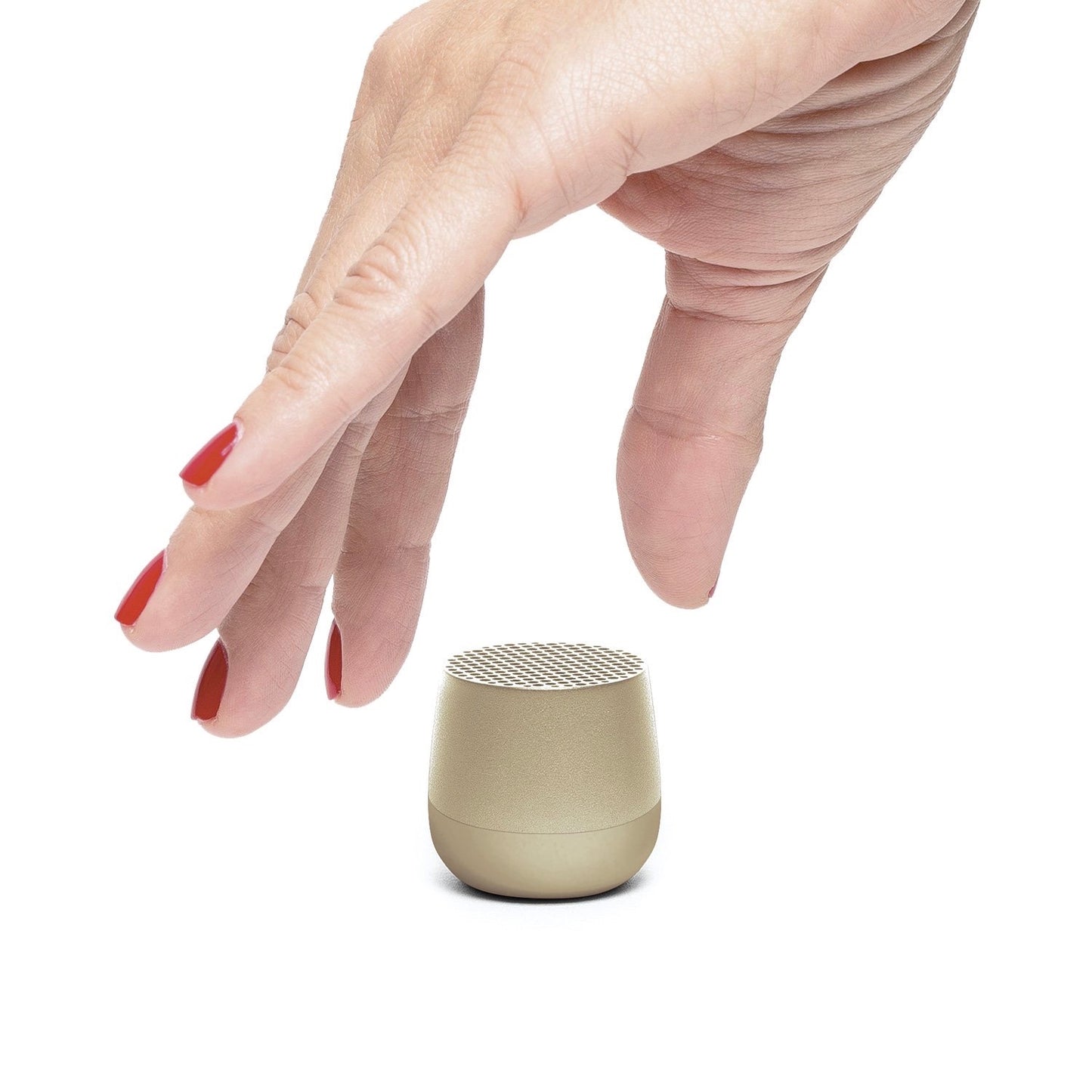 Ultra-portable bluetooth speaker in light gold