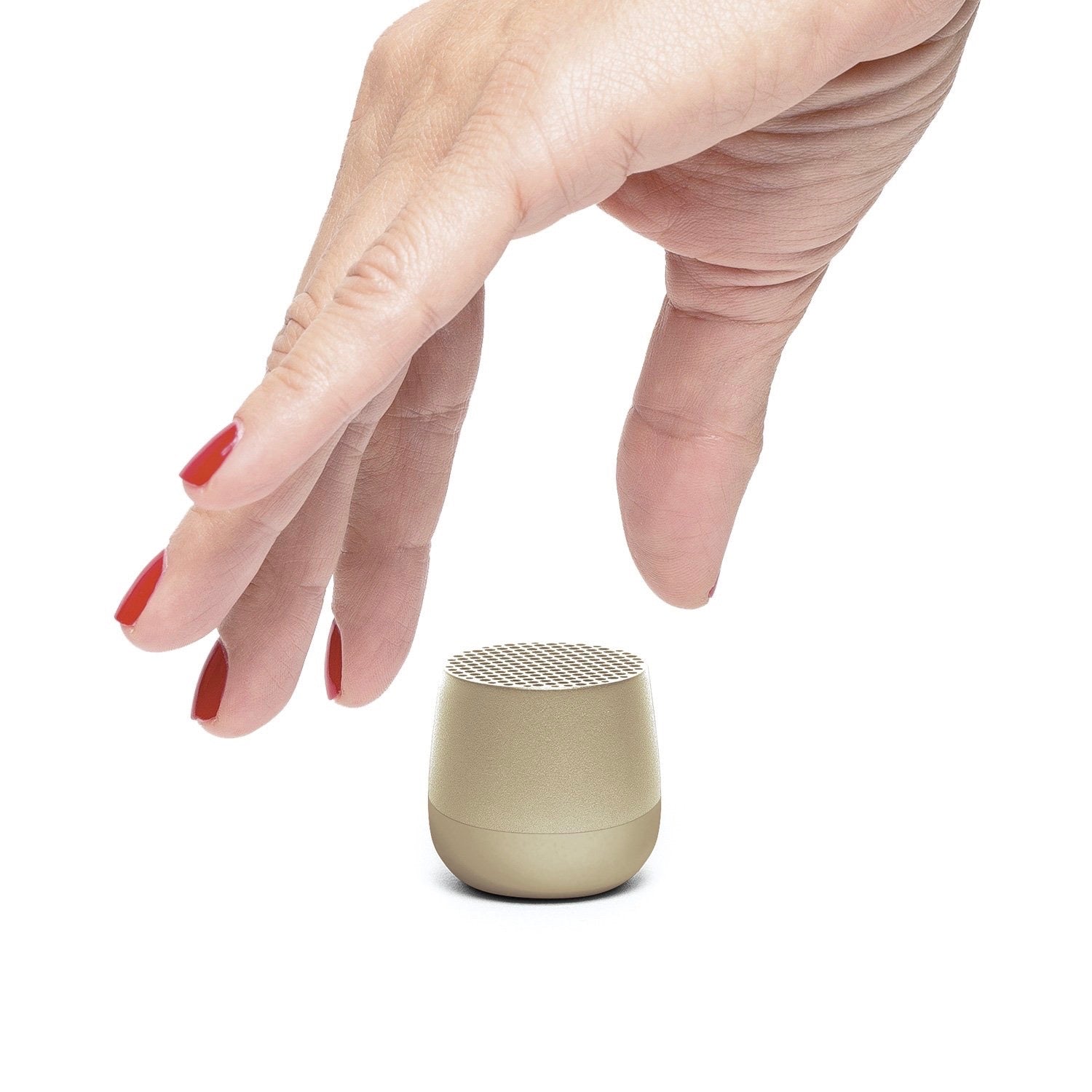 Ultra-portable bluetooth speaker in light gold