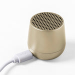 Ultra-portable bluetooth speaker in light gold