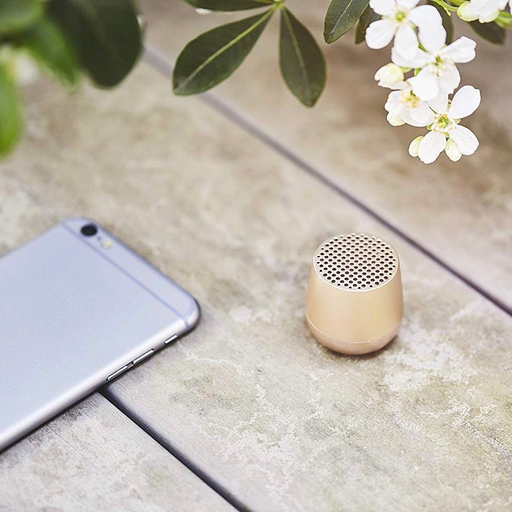 Ultra-portable bluetooth speaker in light gold