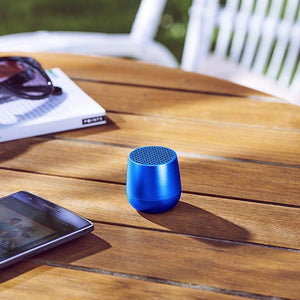 Ultra-portable bluetooth speaker in aqua blue