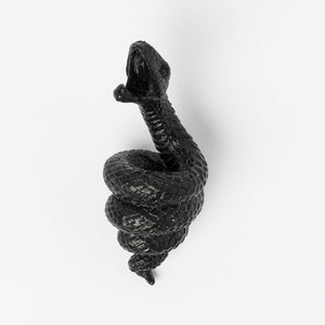 Bottle opener with a mamba snake in black