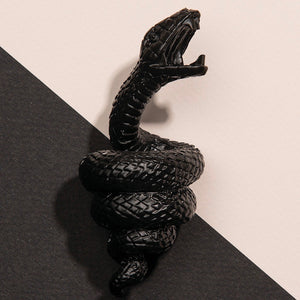 Bottle opener with a mamba snake in black