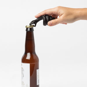 Bottle opener with a mamba snake in black