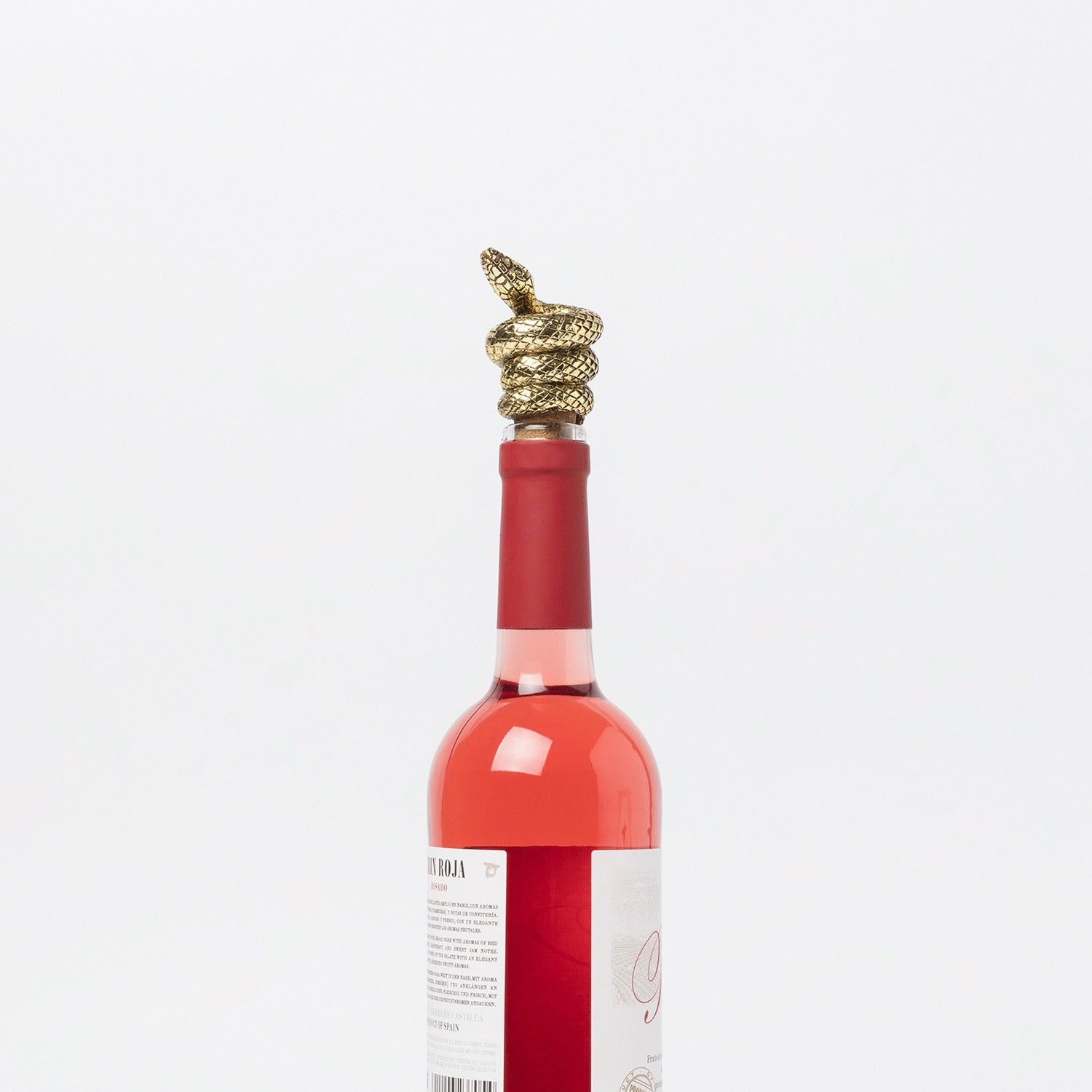 Bottle stopper with a mamba snake in antique gold