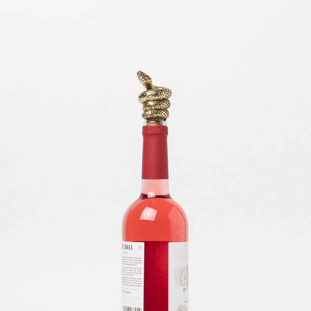 Bottle stopper with a mamba snake in antique gold