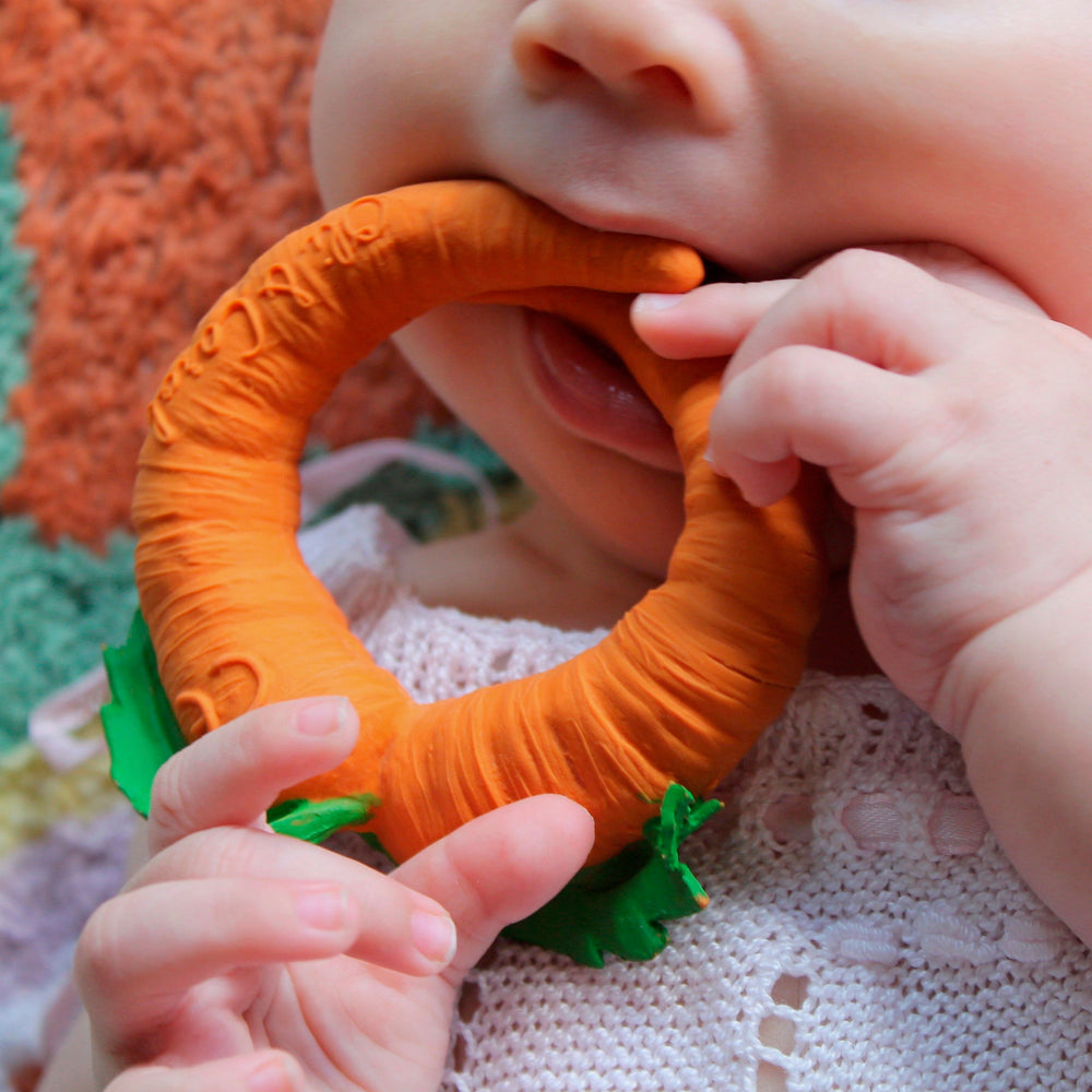 Baby teether toy bracelet Carrot in orange made from natural rubber