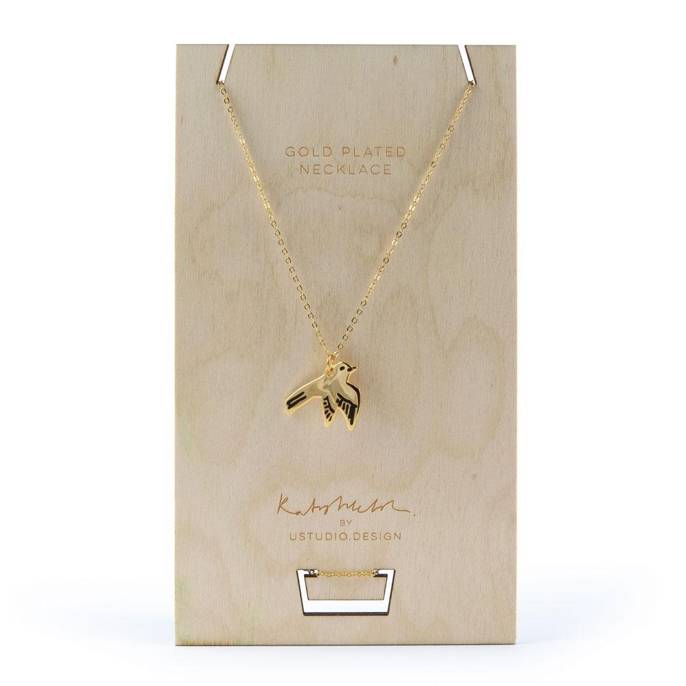 Necklace with a Swallow bird pendant in gold by Katy Welsh