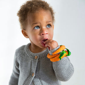 Baby teether toy bracelet Carrot in orange made from natural rubber