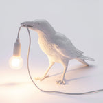 Seletti bird waiting table lamp light in white