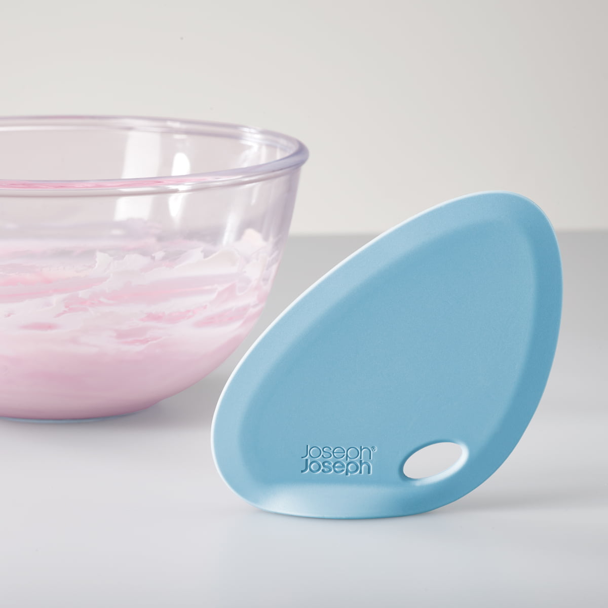 Fin silicone bowl scraper in blue