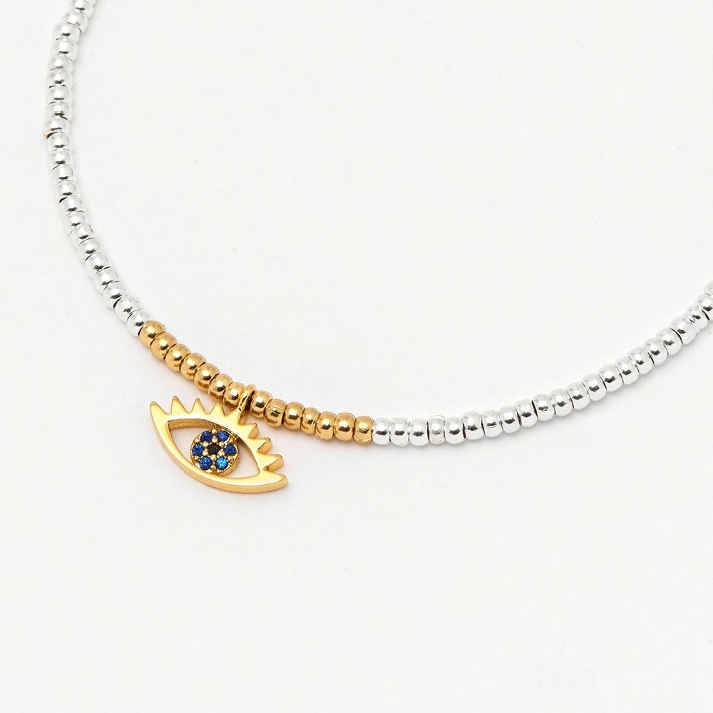 Bracelet with 'Evil eye' blue charm in gold and silver