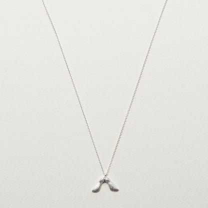 Necklace with maple seed pendant in silver
