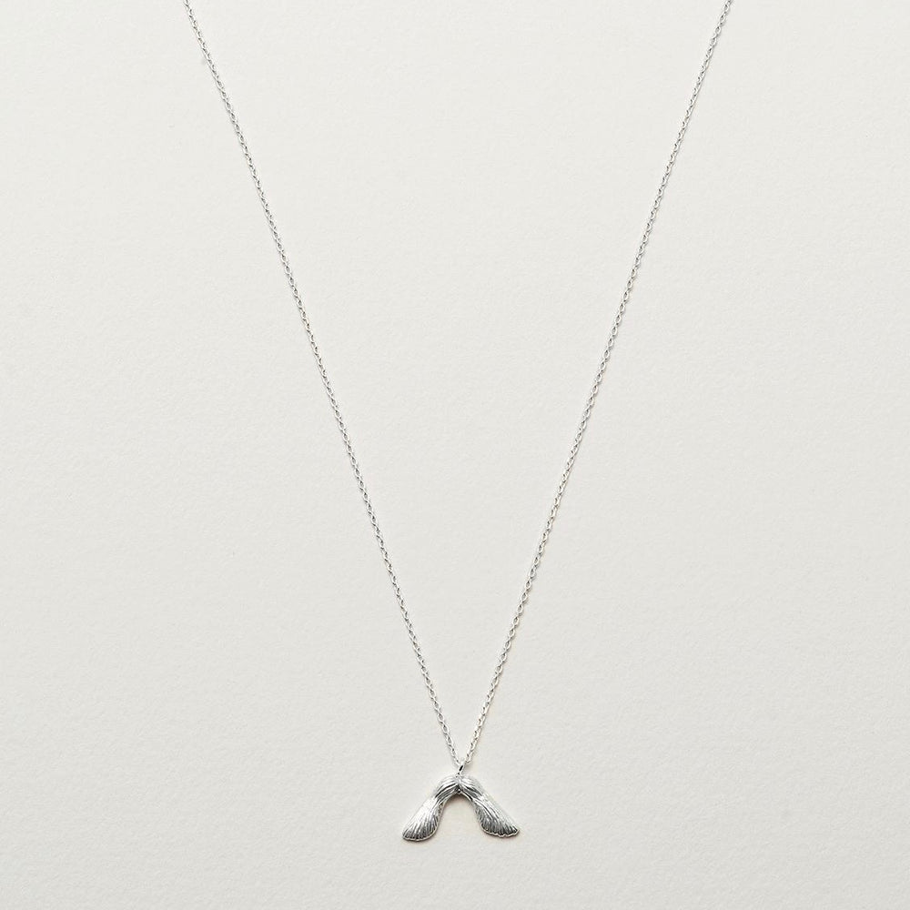Necklace with maple seed pendant in silver