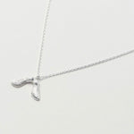 Necklace with maple seed pendant in silver