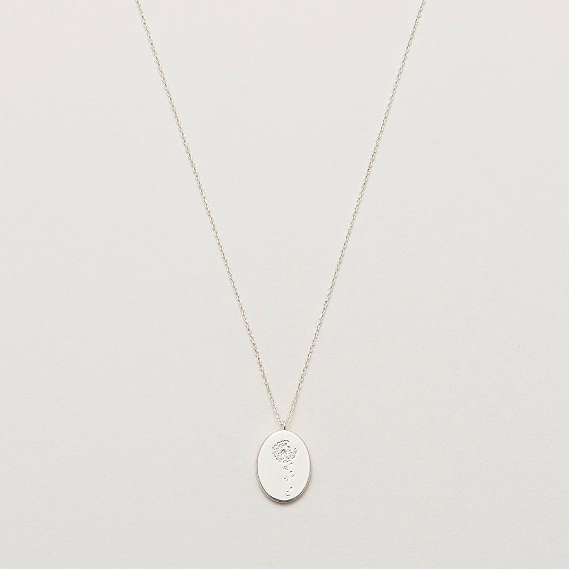 Necklace with a dandelion pendant in silver
