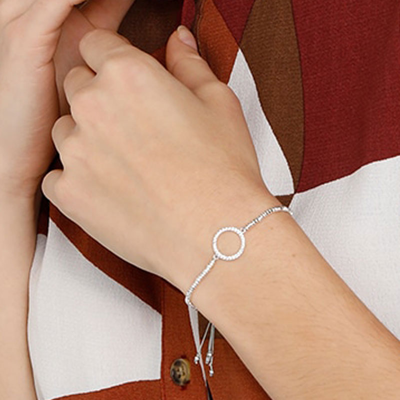 Silver bracelet with a circular cubic zirconia charm