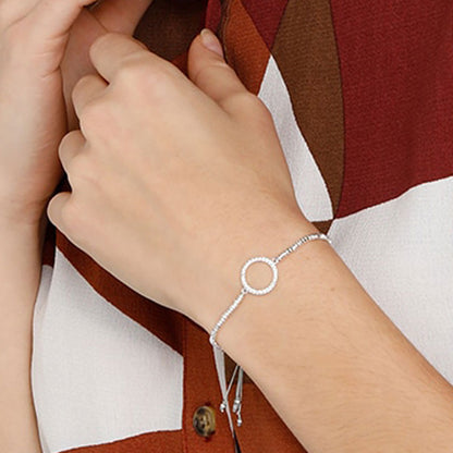 Silver bracelet with a circular cubic zirconia charm