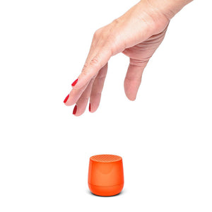 Ultra-portable bluetooth speaker in neon orange