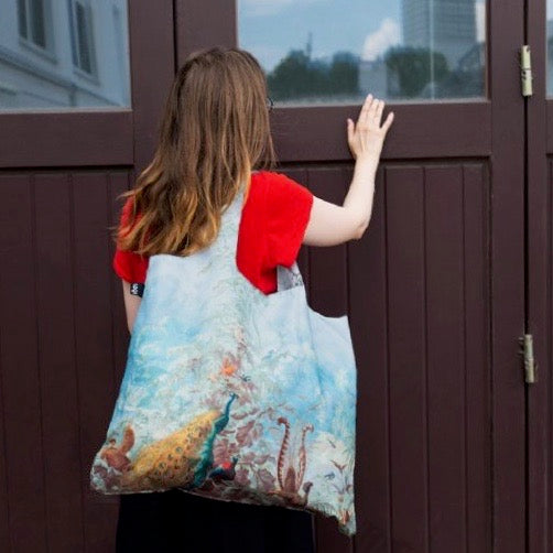 
            
                Load image into Gallery viewer, Foldable Tote bag with &amp;#39;Brazil&amp;#39; scenic peacock artwork by Louis Joseph Fuchs in blue
            
        