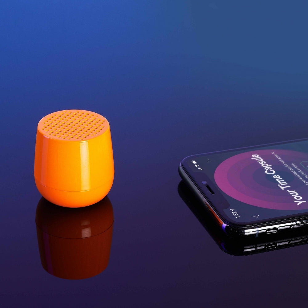Ultra-portable bluetooth speaker in neon orange
